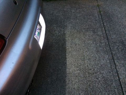 2002 Pontiac Grand Prix - Dusk; lot of light hitting the ground.