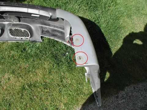 2002 Pontiac Grand Prix - 7mm screw on the lower corners of the bumper.