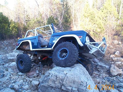 1977 Ford Bronco - This modified 1977 Ford Bronco navigates a challenging rocky obstacle.