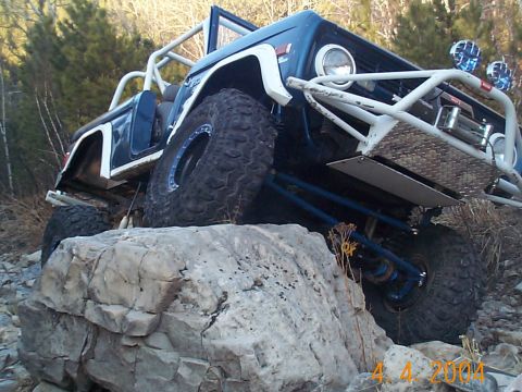 1977 Ford Bronco - This modified 1977 Ford Bronco is shown navigating a challenging rocky terrain.