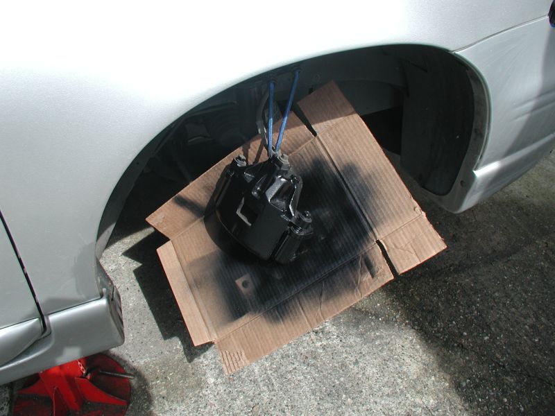 Calipers masked and painted on the car.