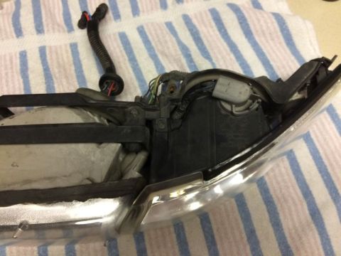 2002 Pontiac Grand Prix - Left clear corner light broken. Markings on the lens indicate that something my have bumped into the lens causing the breakage.