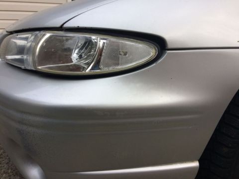 2002 Pontiac Grand Prix - The left corner had a broken mount, so I used some plastic adhesive and metal strips to fix it. I moved the mounting hole inward and forwar…