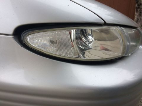2002 Pontiac Grand Prix - The left corner had a broken mount, so I used some plastic adhesive and metal strips to fix it. I moved the mounting hole inward and forwar…