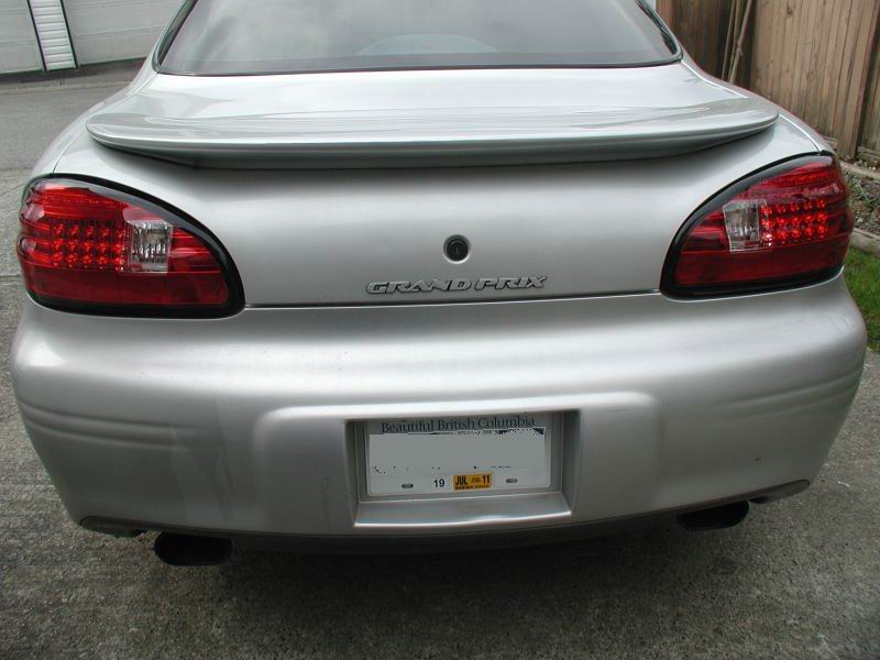 Silver 2002 Pontiac Grand Prix rear view