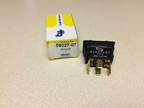 2002 Pontiac Grand Prix - Cole Hersee #58027-07, DPDT, on/off/onrocker switch. The SPDT version is #58027-03.