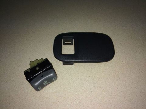 2002 Pontiac Grand Prix - I got this "Seat Heater" switch a while back (I don't have heated seats) and it is where the new switch will go.