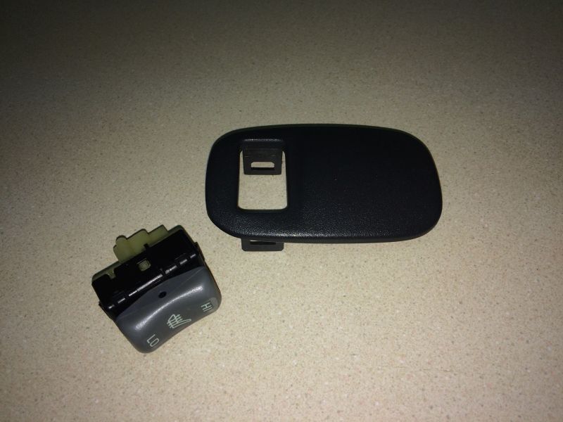 I got this "Seat Heater" switch a while back (I don't have heated seats) and it is where the new switch will go.