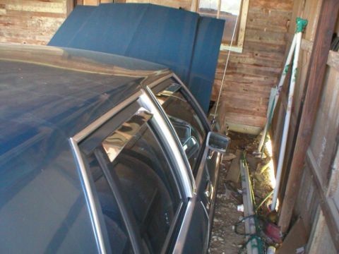 1987 Ford Crown Victoria LTD - 1987 Ford Crown Victoria LTD parked inside a garage with its hood up.