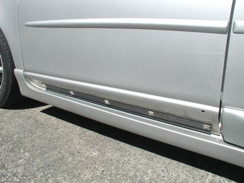 2002 Pontiac Grand Prix - Old double-sided tape removed from the door. I kneaded the old tape off by hand, then cleaned the surface with brake clean.