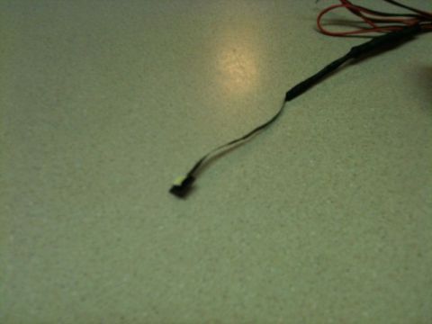 2002 Pontiac Grand Prix - The notch is to let the ribbon cable pass through.