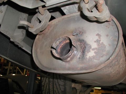 2002 Pontiac Grand Prix - Both the mufflers and the tips are 2.25" ID, so a sleeve was used to get the new tips in the ideal position.