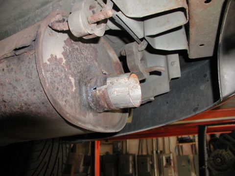2002 Pontiac Grand Prix - Both the mufflers and the tips are 2.25" ID, so a sleeve was used to get the new tips in the ideal position.