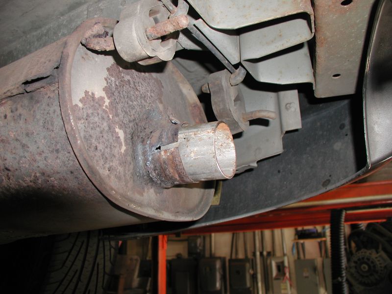 Both the mufflers and the tips are 2.25" ID, so a sleeve was used to get the new tips in the ideal position.