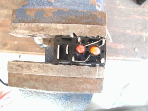2002 Pontiac Grand Prix - Unsolder the orange bulb from the hi beam +/- terminal and solder it to the red bulb - terminal.