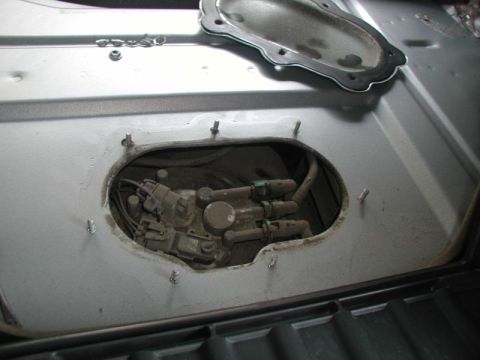 2002 Pontiac Grand Prix - Remove the 7 10mm nuts and pry the panel off.