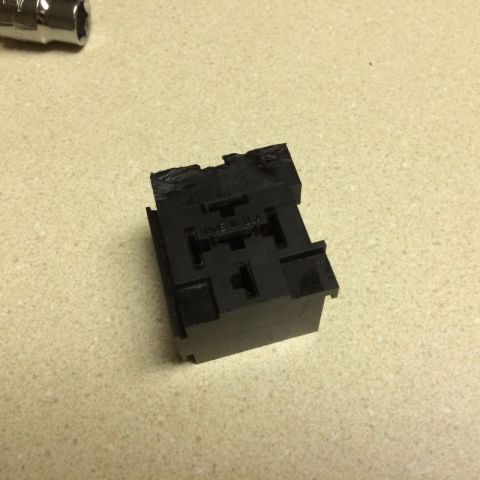 2002 Pontiac Grand Prix - Relay base with the mounting tab cut off.