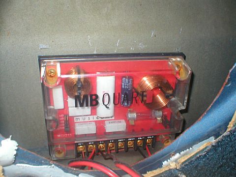 1987 Ford Crown Victoria LTD - Close-up of an MB Quart speaker crossover component, showing its internal wiring and circuitry.