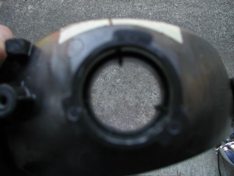 2002 Pontiac Grand Prix - Remove the metal piece that surrounded the light bulb.