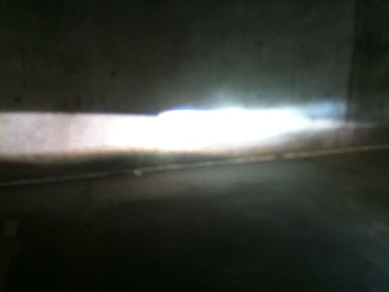 In car test; confirmed to be tilting low to the right and angled to far to the right.
