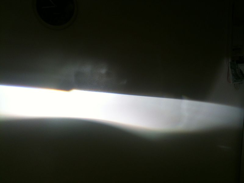 Holding the projector in the housing; I was able to get it sitting where it needed to be.