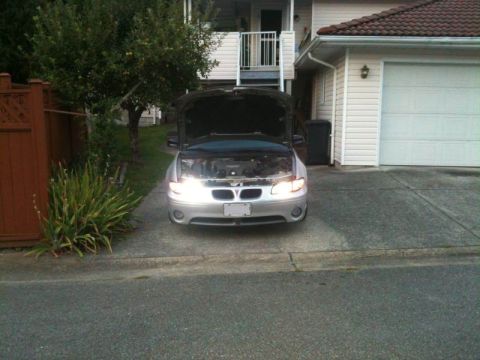 2002 Pontiac Grand Prix - Drivers housing installed; 6000K PNP on passenger, 5000K projector on driver.