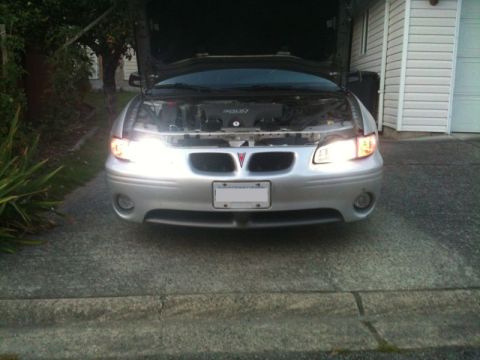 2002 Pontiac Grand Prix - Drivers housing installed; 6000K PNP on passenger, 5000K projector on driver.