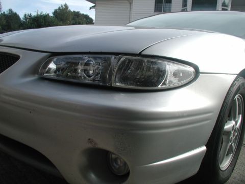2002 Pontiac Grand Prix - Showing the poor fit of the headlights and corner lighs.