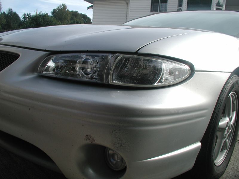 Showing the poor fit of the headlights and corner lighs.