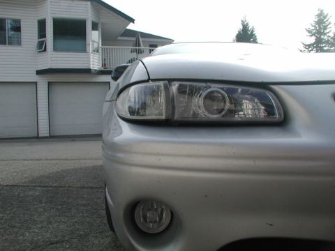 2002 Pontiac Grand Prix - Showing the poor fit of the headlights and corner lighs.