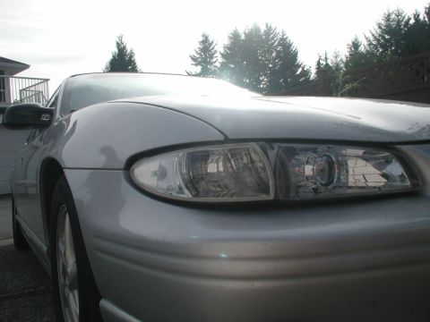 2002 Pontiac Grand Prix - Showing the poor fit of the headlights and corner lighs.