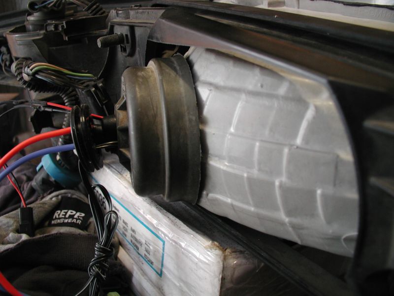 The grommet keeps it in place.