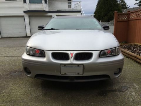 2002 Pontiac Grand Prix - Daytime with the demon eyes.