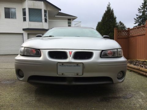 2002 Pontiac Grand Prix - Daytime with the demon eyes.