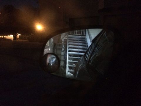 2002 Pontiac Grand Prix - Looking out the left window from the drivers seat, into the sideview mirror; reverse lights on.