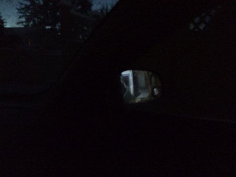 2002 Pontiac Grand Prix - Looking out the right window from the drivers seat, into the sideview mirror; reverse lights on.