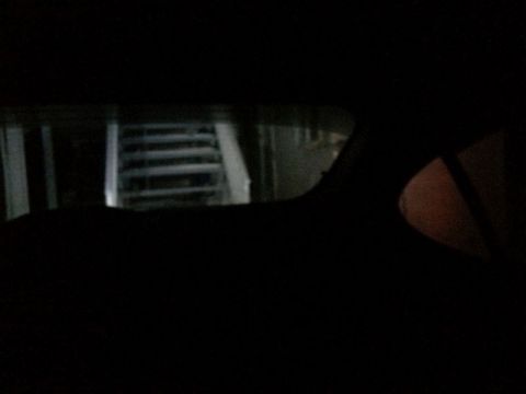 2002 Pontiac Grand Prix - Looking out the back window from the drivers seat; reverse lights on.