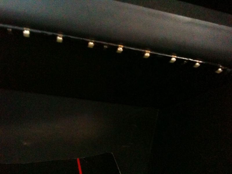 LED strip lights mounted on a dark interior panel.