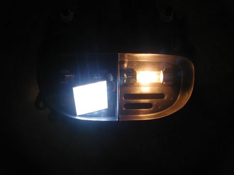 2002 Pontiac Grand Prix - A close-up view shows a modified interior light fixture with two different light sources. One side features a bright white LED panel, while…