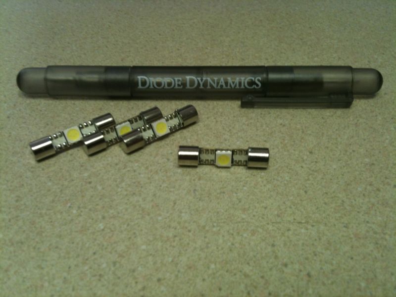 Pen with "DIODE DYNAMICS" text and three LED bulbs
