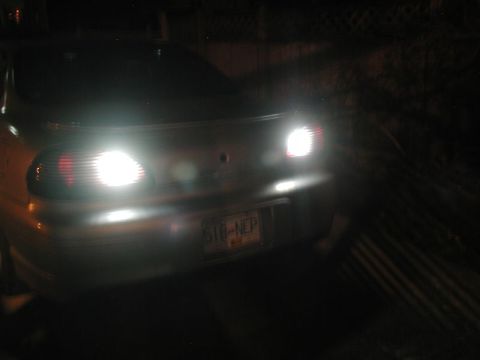 2002 Pontiac Grand Prix - Stock lighting with LED back-up bulb on the left, LED lighting with LED back-up bulb on the right.