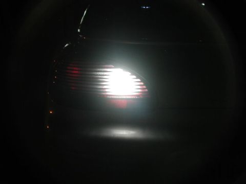 2002 Pontiac Grand Prix - Stock lighting with LED back-up bulb on the left, LED lighting with LED back-up bulb on the right.