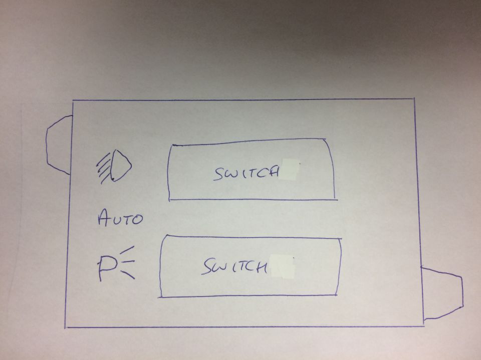 Diagram of a control panel with two switches, headlight symbol, and text labels.
