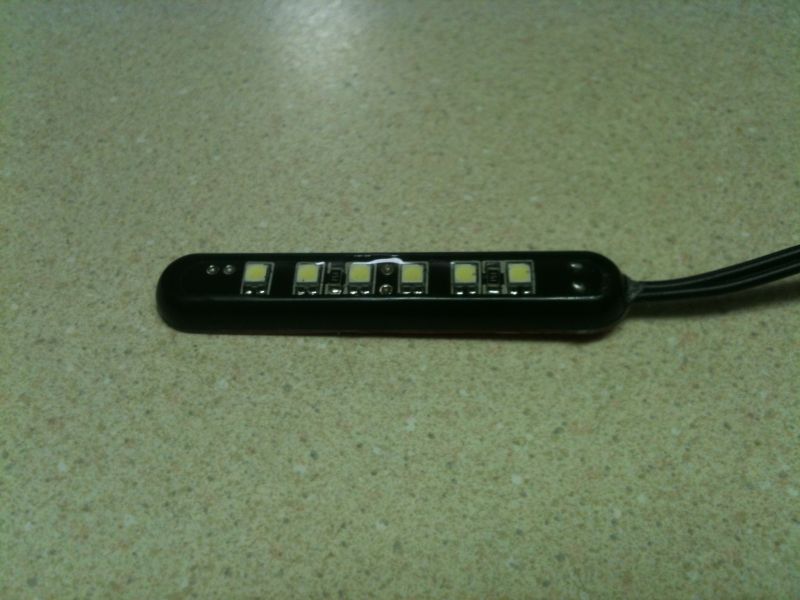 The puddle light was too bright, so I masked off half of the LED's and sprayed some black paint.