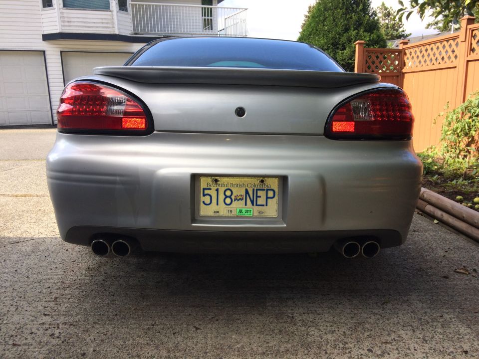 Silver 2002 Pontiac Grand Prix rear view with British Columbia license plate