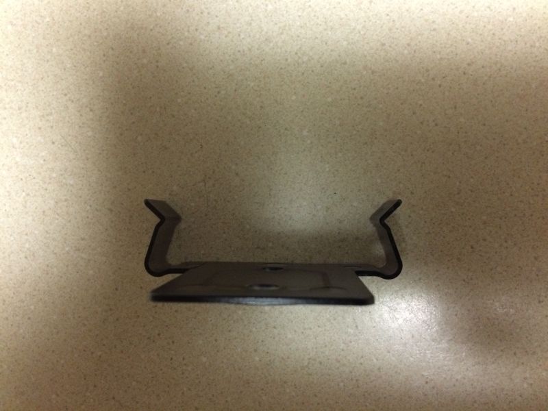 Dark metal bracket with angled arms and two holes