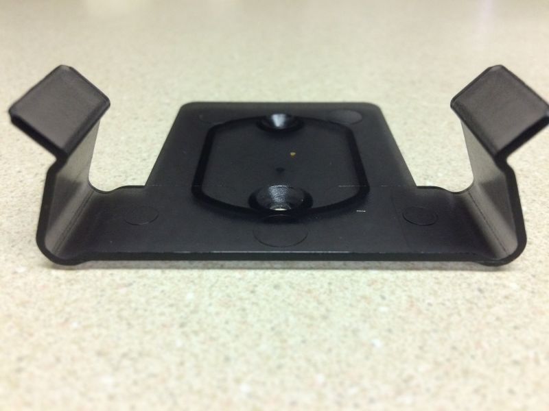 Black plastic bracket with two prongs