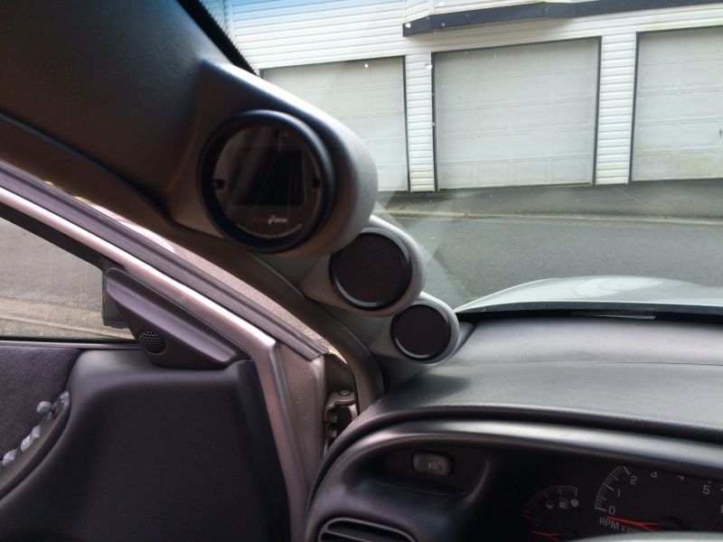 I decided to move the Aeroforce to the upper hole. The glare from the windshield made it difficult to see the gauge in the day light. I also covered the holes in the ower pods until I decide what other gauges to get.