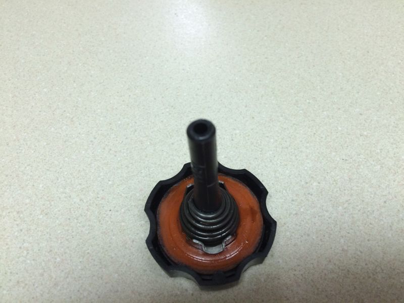 The hole in the cap is hair over 1/8". I cleaned it with brake cleaner and gave it time to dry.