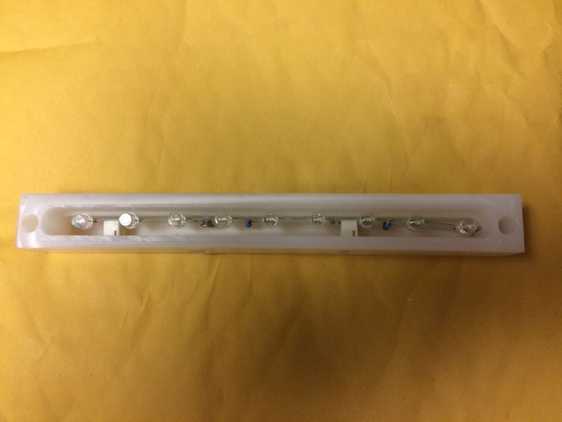 Linear LED light strip in white housing